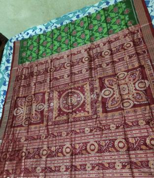 Exclusively woven Parrot and Lotus Motifs Double Ikat Silk Saree with blouse Piece