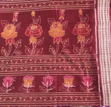 Rose motifs Cotton Ikat Fabric in Maroon color