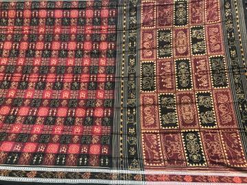 Intricately woven tribal and auspicious motifs cotton Ikat saree without blouse piece