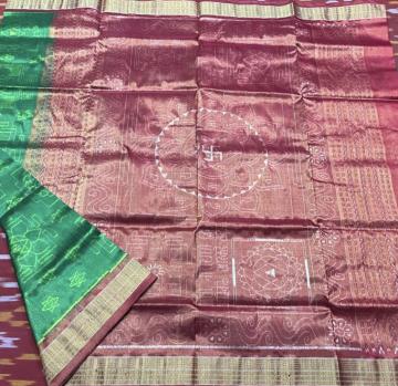 Intricately woven Laxmi yantra theme Tissue Silk Ikat Saree with blouse piece