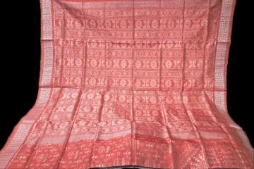 Exquisite intricately woven tribal motifs peach color Ikat weave Silk saree with blouse piece