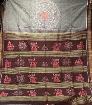 Centrally placed jhoti motifs on the body with elephant and lotus motifs Aanchal cotton Ikat saree