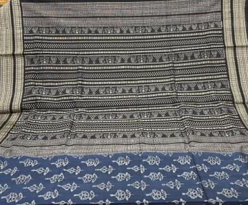 Intricately woven master weaver s creation natural dyed Ikat weave silk saree with blouse piece
